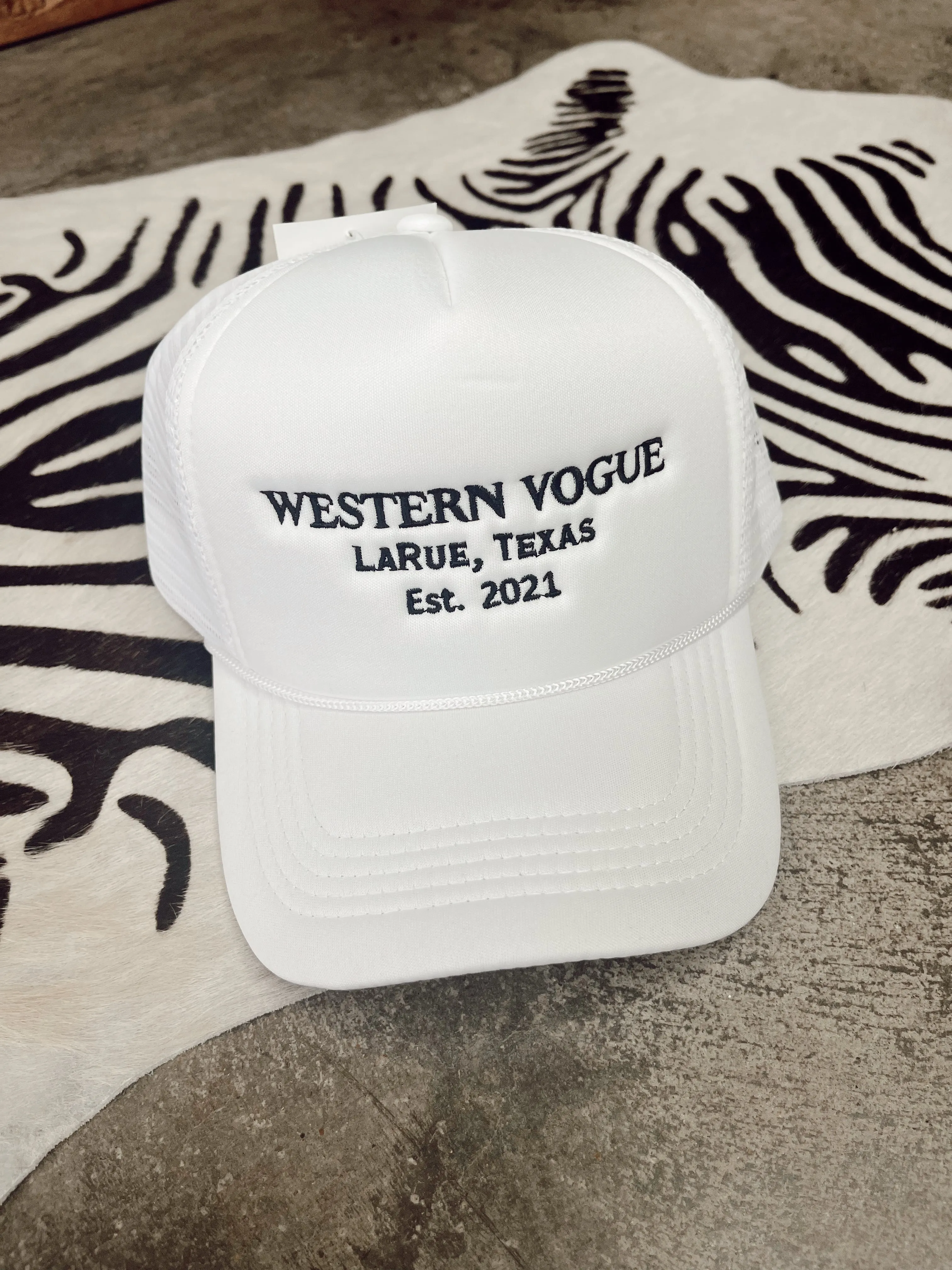 The EST. 2021 Western Vogue Trucker Hat in White